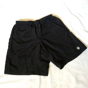 Men's medium Canari black swim trunks LIKE NEW lined shorts